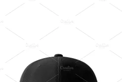 A plain black baseball cap mockup with a curved brim, displayed against a w...