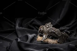 Brown carnival mask containing mask, venetian, and brown