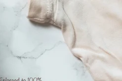 Hands in frame with fashion items