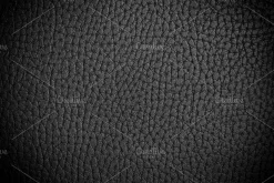 Leather texture containing leather, black, and background